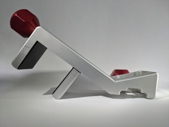 Treat Clincher limited edition in sliver with red handles side view.