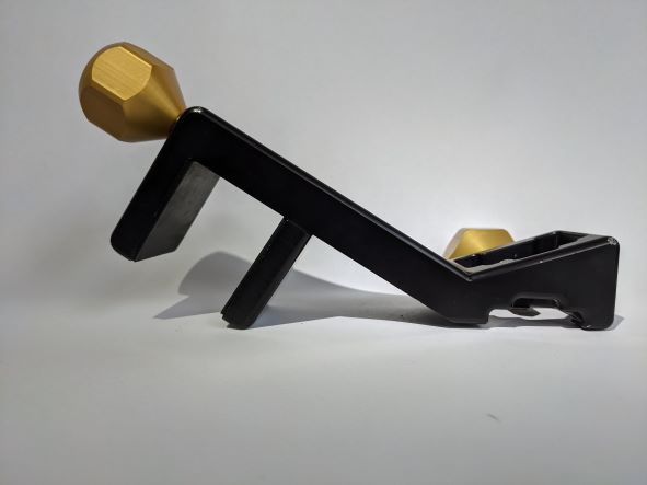 Treat Clincher black anodised with gold handles side view